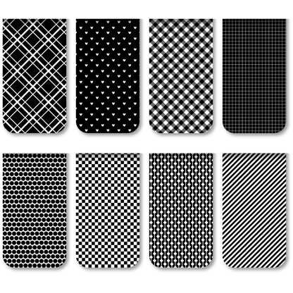 Set of black and white patterned nail wraps arranged in a grid.